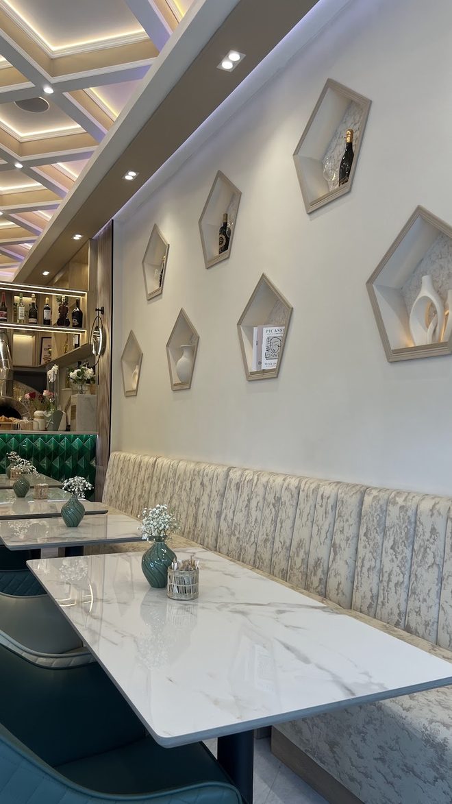 Banquette seating and arched wall niches